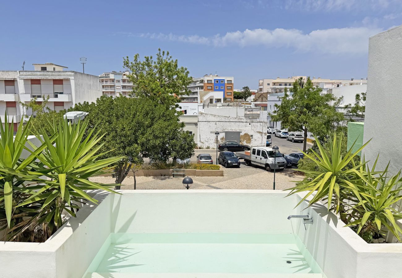 Casa geminada em Olhão - Cubista Designer House Olhão